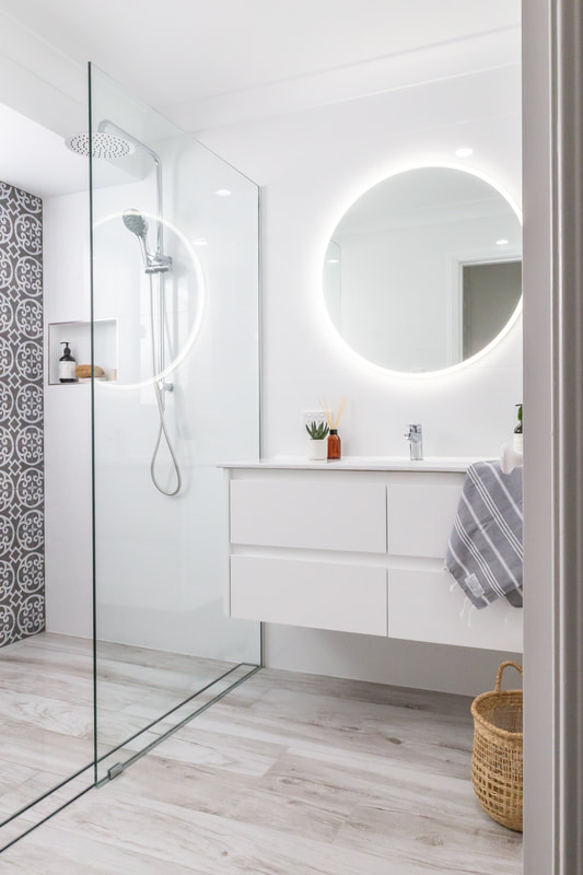A wet room bathroom design with shower and vanity in Ballina NSW by Northern Rivers Bathroom Renovations.