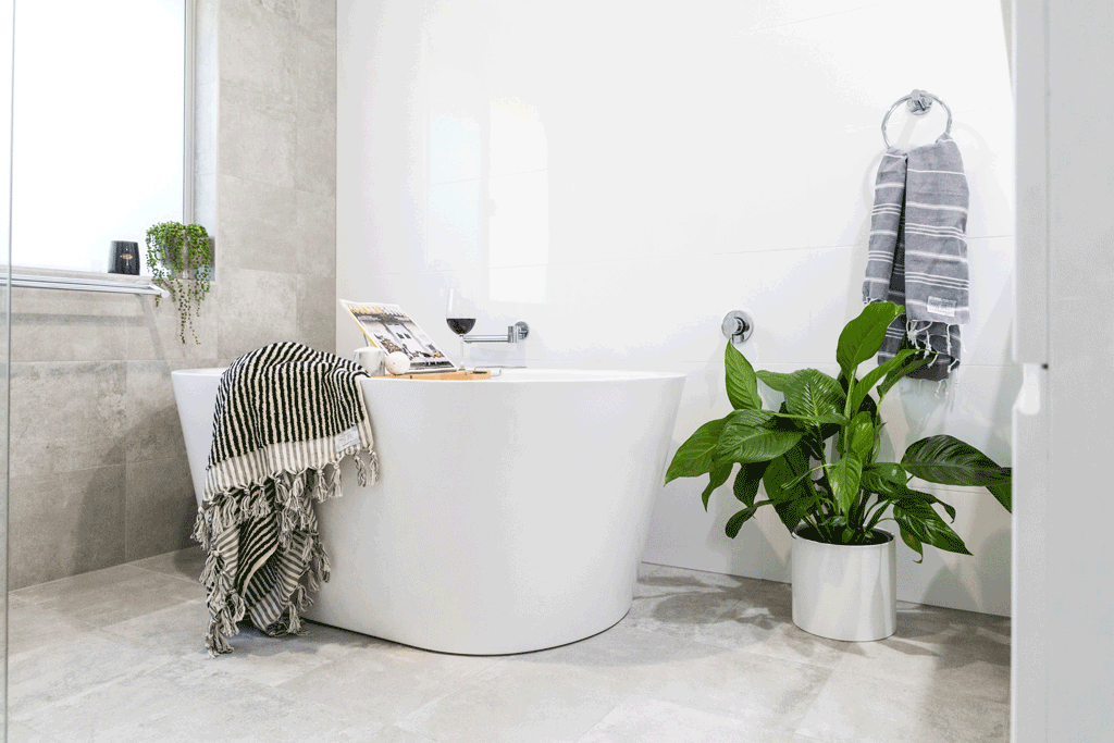 Grey & white Bathroom renovation in Ballina NSW with freestanding bath.