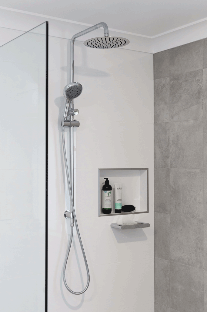 Grey & white tiled walk in shower with Chrome twin shower rail in bathroom renovation, Ballina NSW