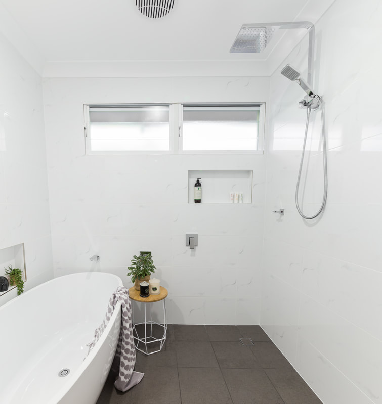 Frame-less shower in wet room bathroom design by Northern Rivers Bathroom Renovations in Alstonville NSW 2477.