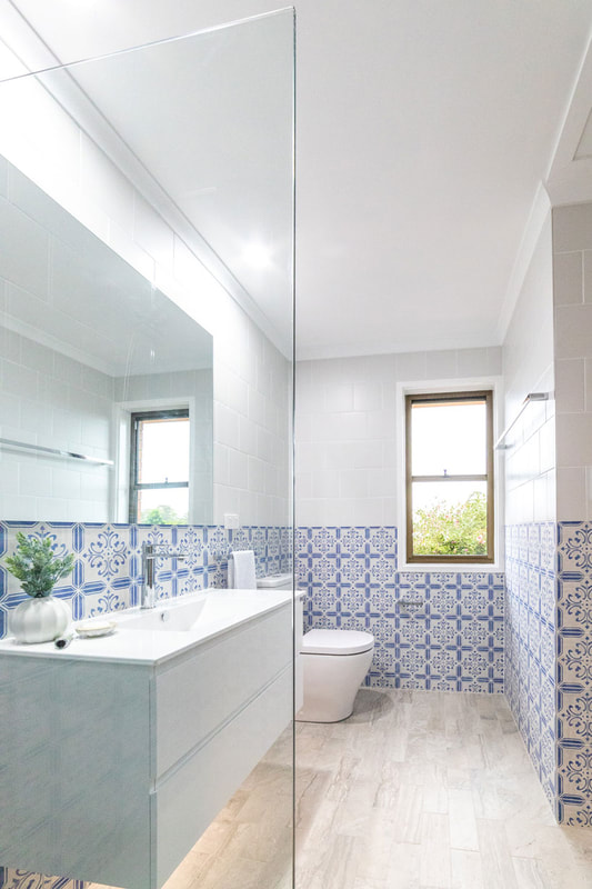 ensuite addition to main bedroom featuring blue and white painted del maiolica tiles in Goonellabah NSW 2480