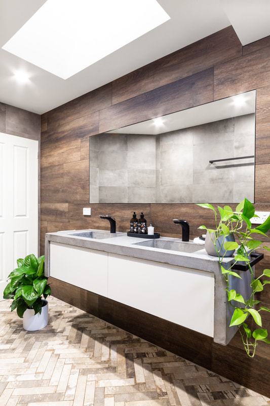 Industrial Bathroom Design, Ballina NSW, concrete vanity top, timber look wall tile, heeringbone floor.