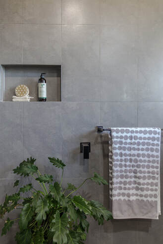 grey porcelain tiles on bathroom wall in Wollongbar NSW by Northern Rivers Bathroom Renovations
