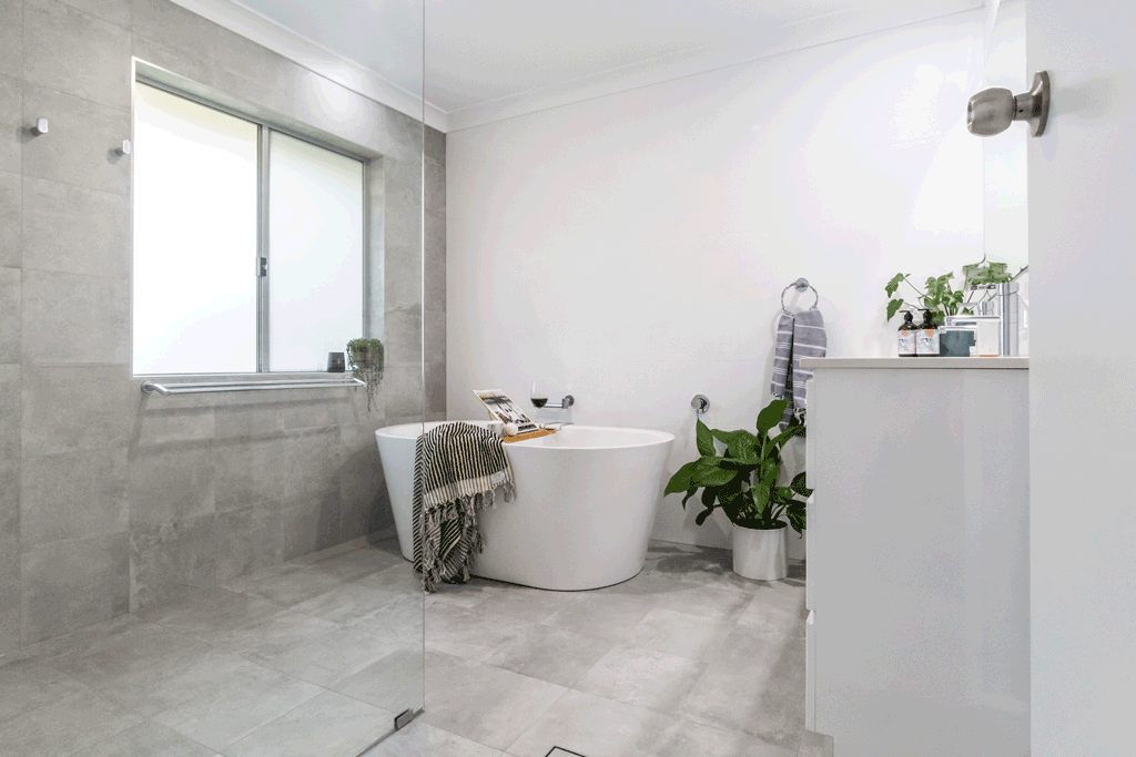 Grey & white Bathroom renovation in Ballina NSW with freestanding bath.